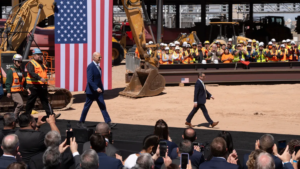 President Biden walks at Intel's semiconductor manufacturing campus in Arizona