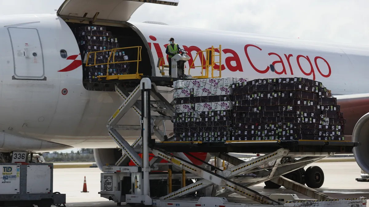 Flowers are being loaded onto an Avianca aircraft