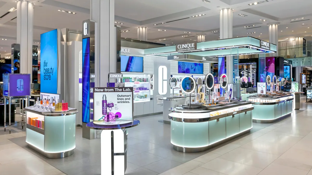 A beauty area with Clinique products and mirrors for customers to try on products.