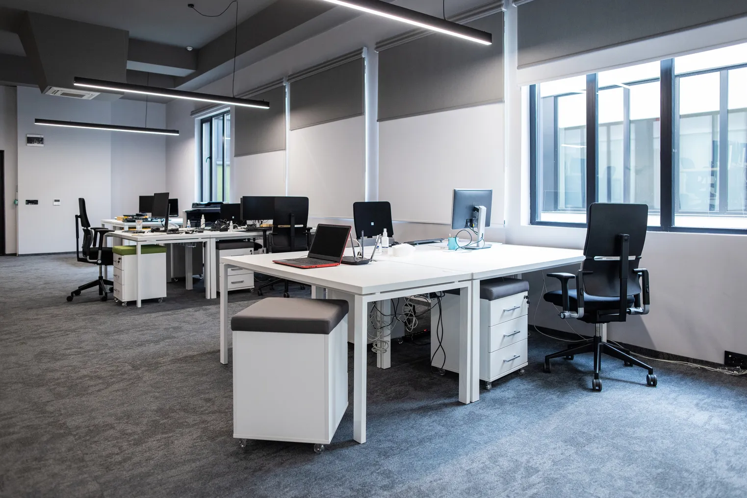 An empty office with computer equipment