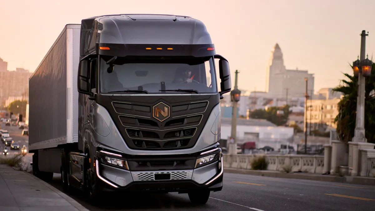 A Nikola Tre BEV electric truck in a city.