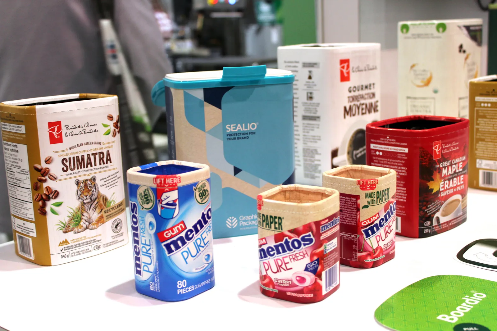 Nine types of colorful fiber-based packages, made by Graphic Packaging International, for food, candy and snacks.