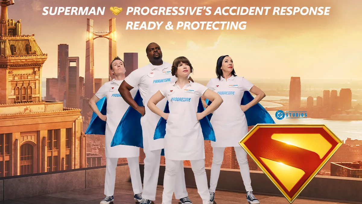 A quartet of Progressive insurance mascots stand in heroic poses on a rooftop against the backdrop of Metropolis from "Superman"