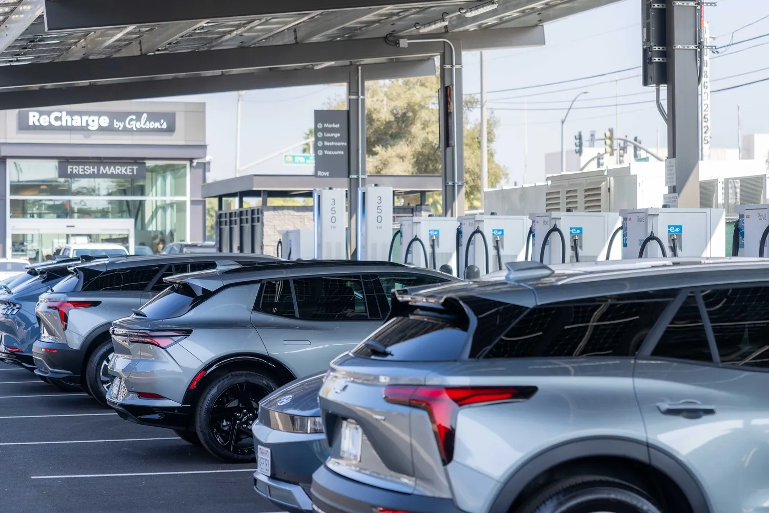 A photo of cars at an EV charging hub.