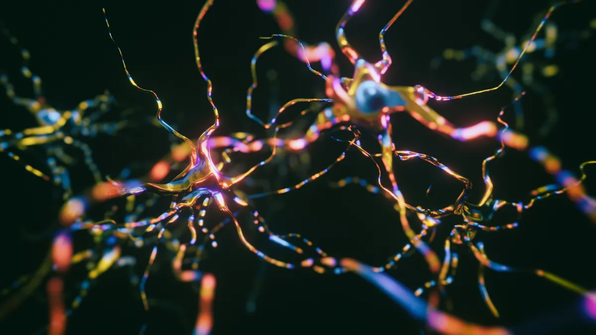 An illustration of interconnected neurons with electrical pulses.