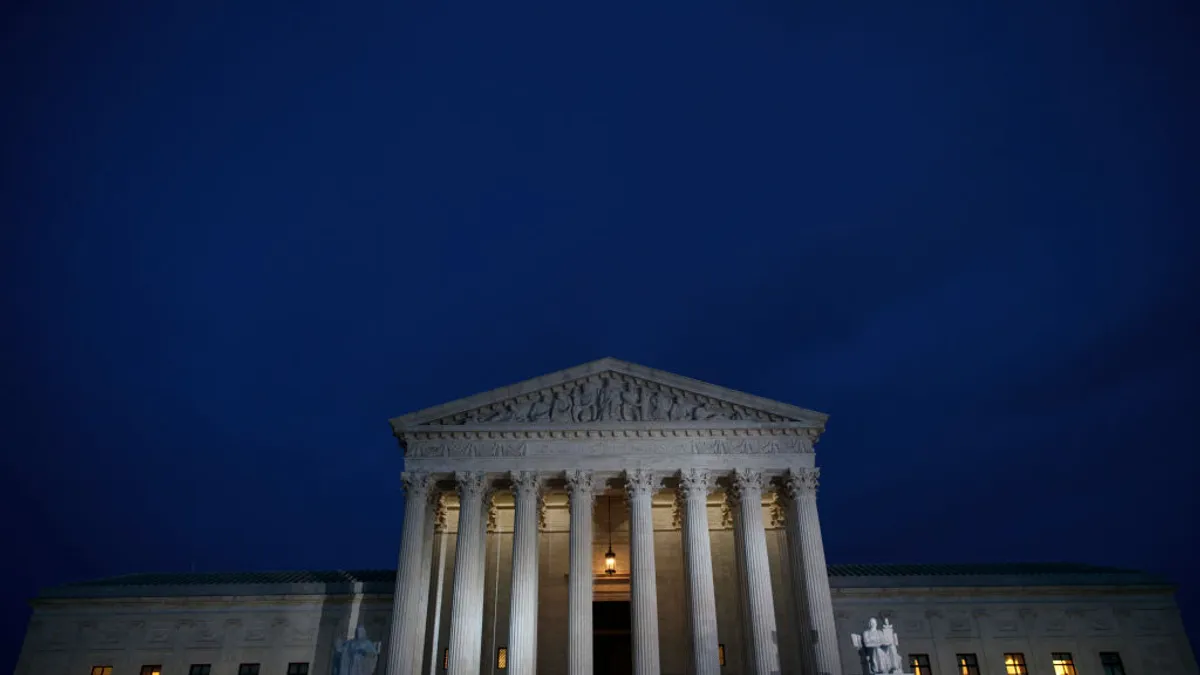 Supreme Court building illuminated at night