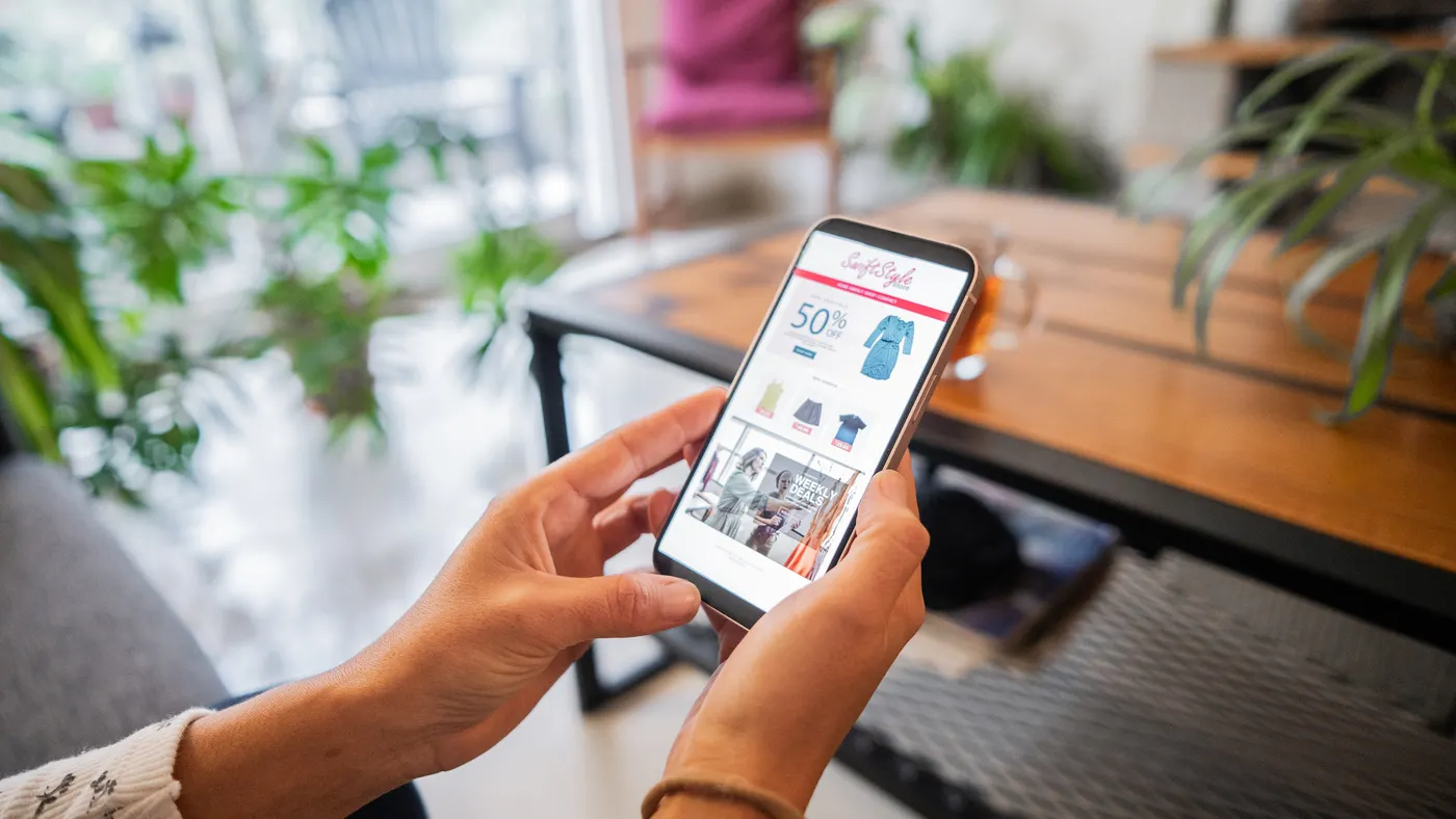 A customer browses an e-commerce site on their phone.