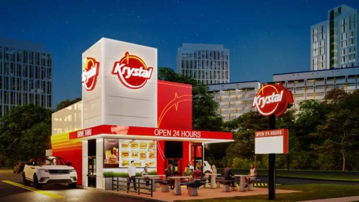 An image of a white and red restaurant with Krystal on the signage