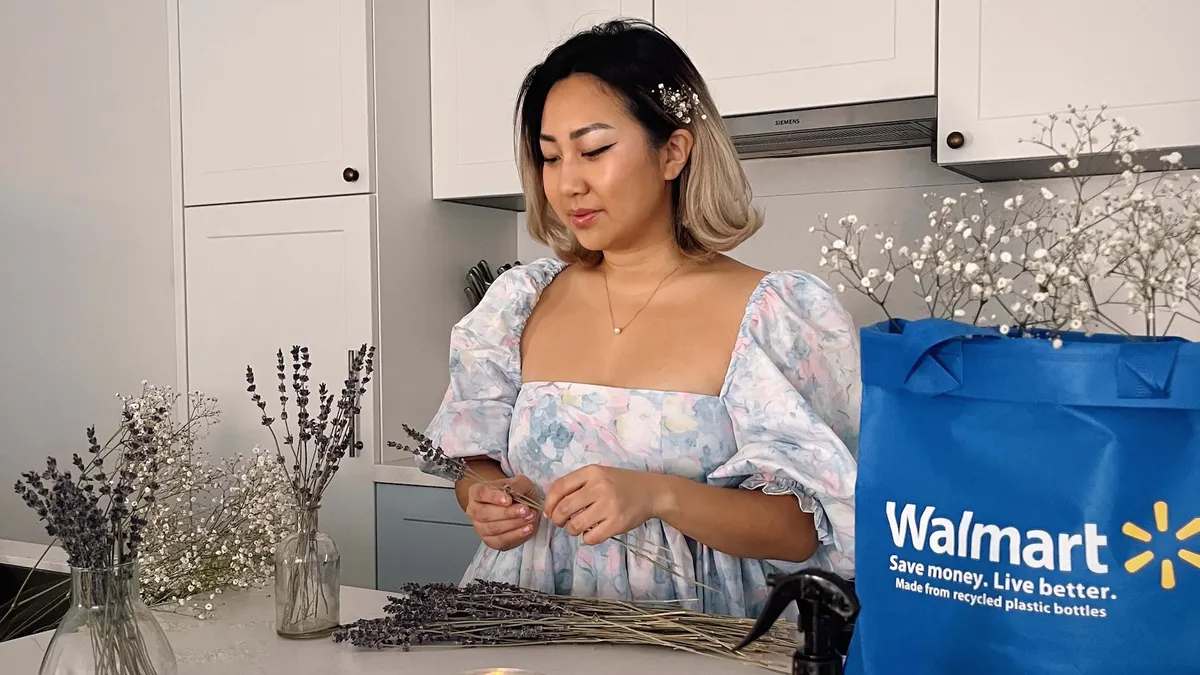 An influencer arranges flowers