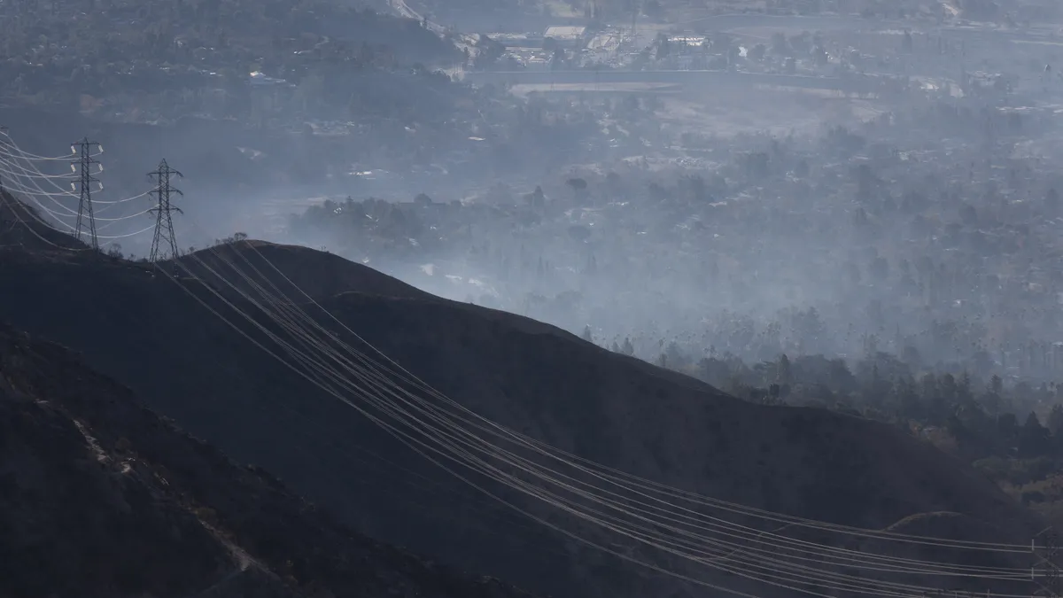 Multiple wildfires fueled by intense Santa Ana Winds are burning across Los Angeles County, with some containment achieved by fire crews.