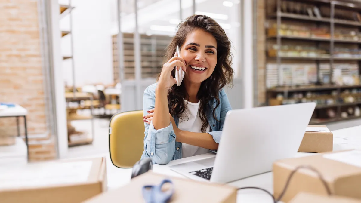 Young businesswoman speaking on the phone