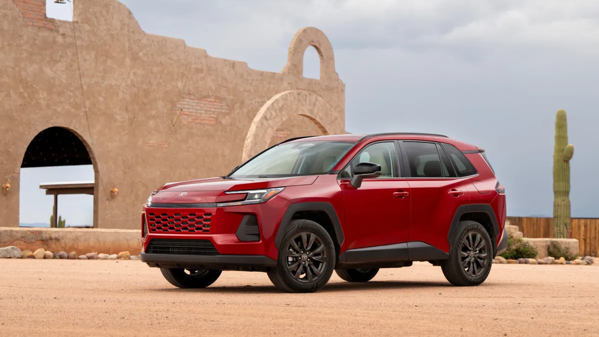 A ruby flare pearl 2026 Toyota RAV4 HEV XLE Premium.