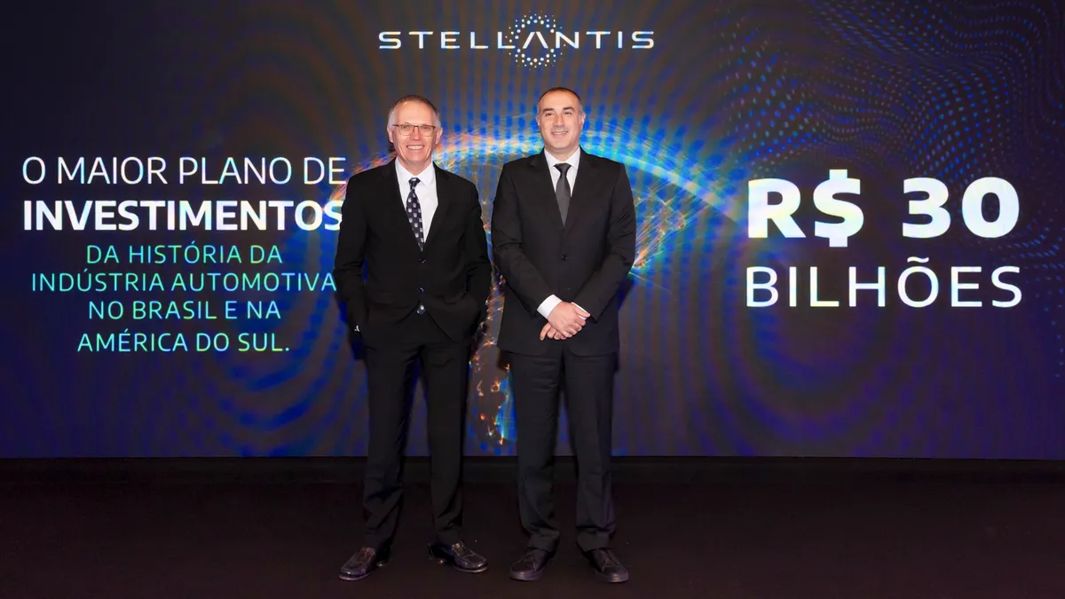 Stellantis CEO Carlos Tavares and the automaker's South America COO Emanuele Cappellano pictured together in a press photo.