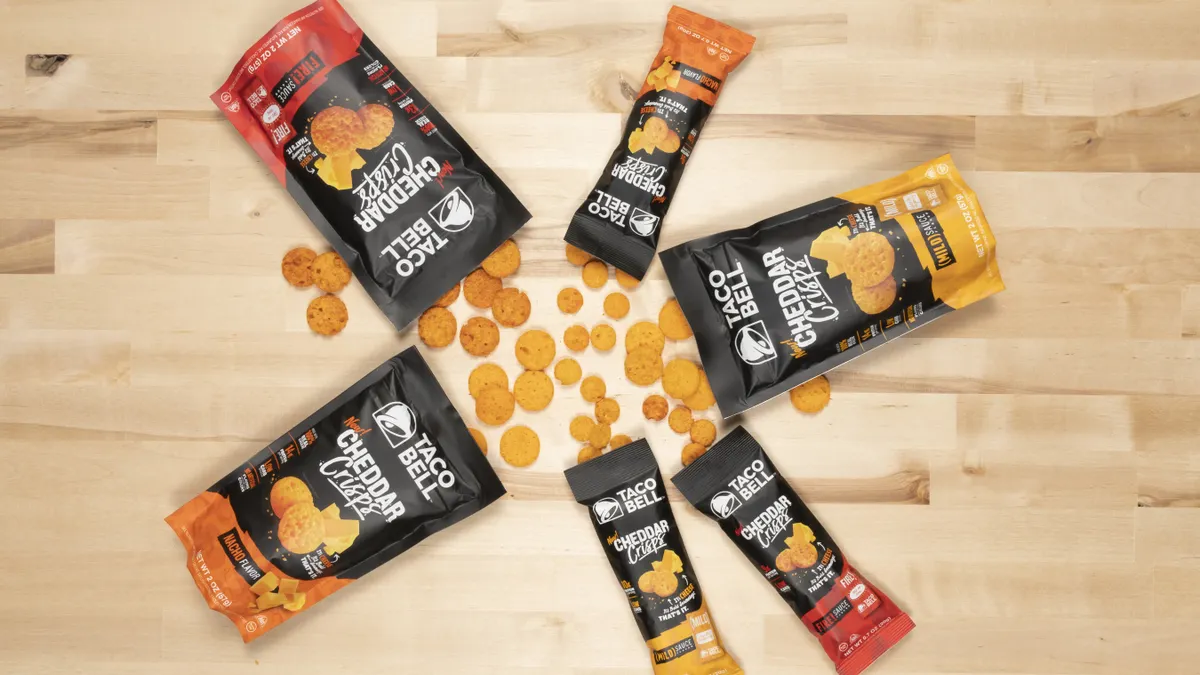 Taco Bell released Cheddar Crisps, a baked cheese snack inspired by its hot sauce flavors.