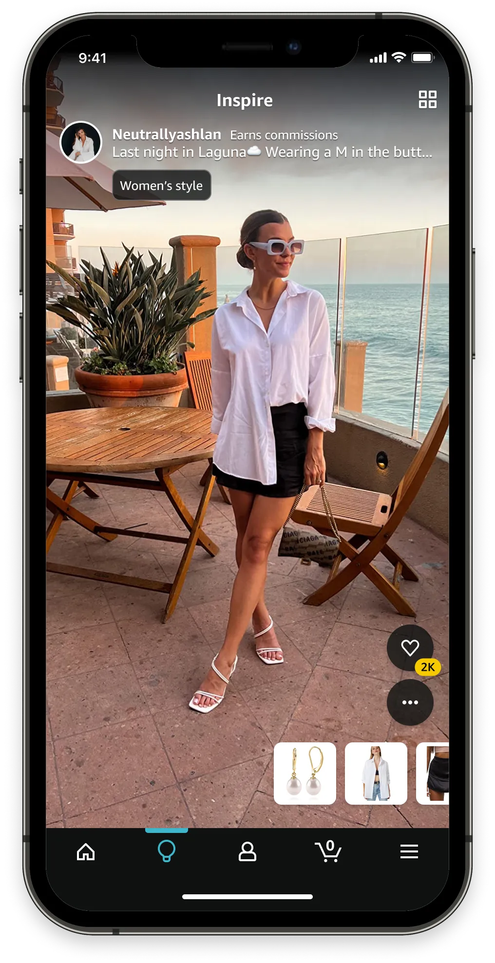 Screenshot of a person wearing a white dress and black sunglasses