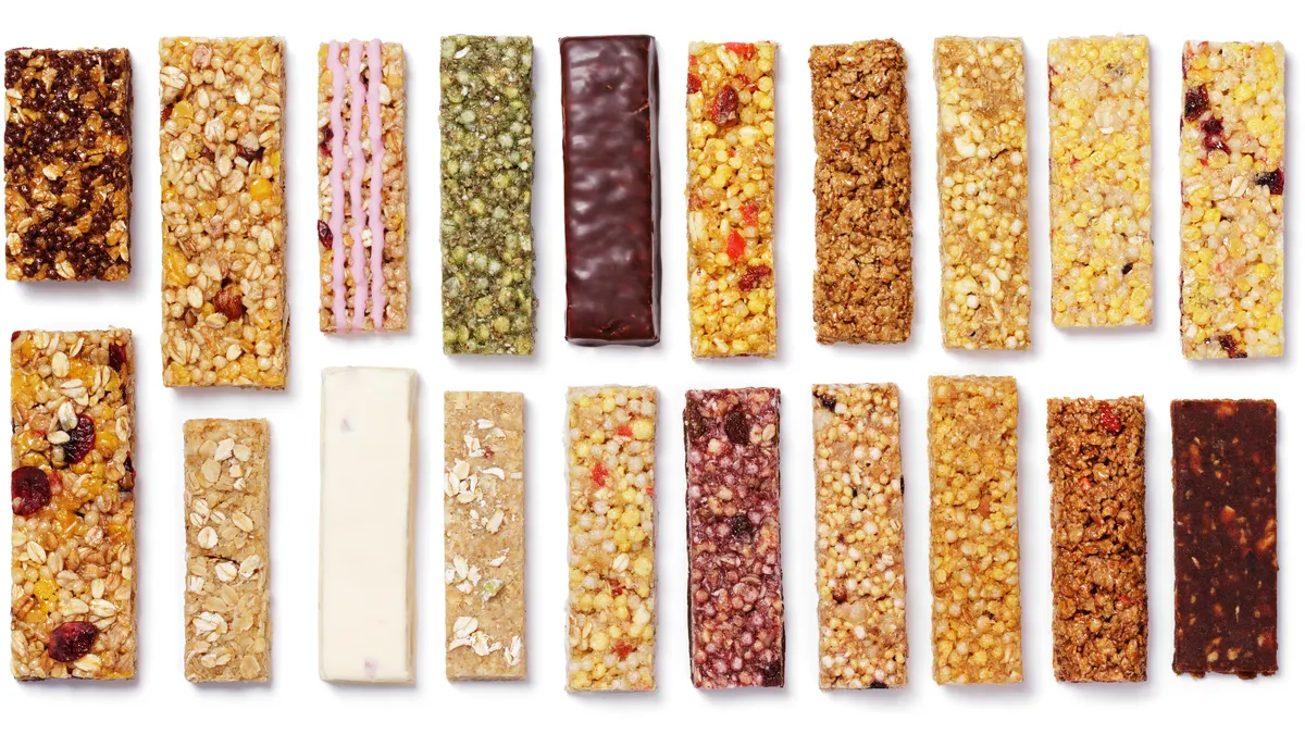 Top view of various healthy granola bars (muesli or cereal bar). Set of protein bar isolated on white background