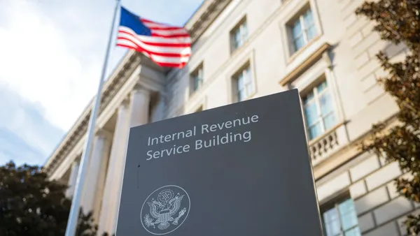 The IRS building pictured outside with an American flag