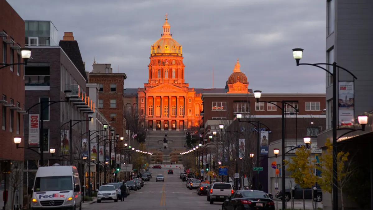 The Iowa Capitol building illuminated by the sun.