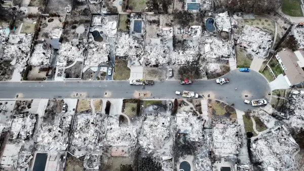 Multiples rows of homes burned in California fires.