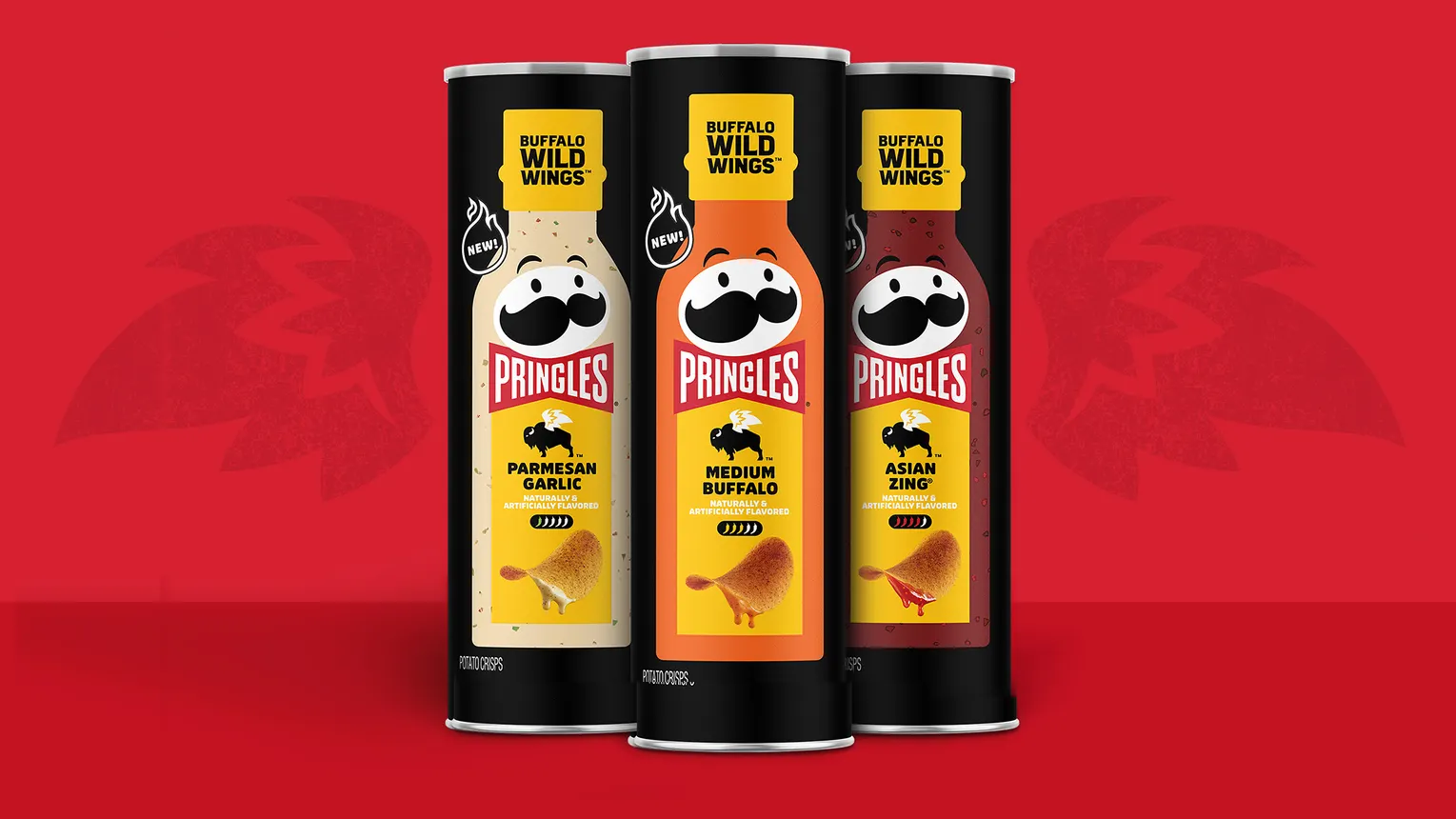 Three cans of Pringles that are inspired by Buffalo Wild Wings sauce.