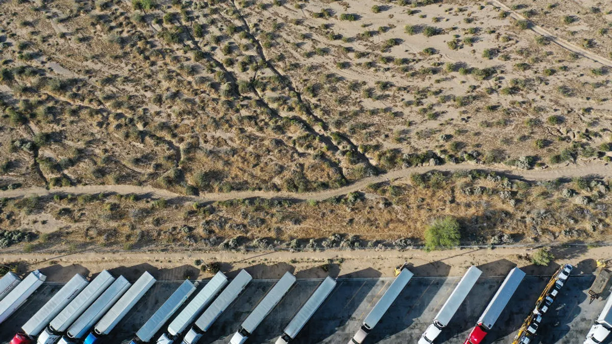 An overhead view of trucks at a truck stop in Barstow, California.