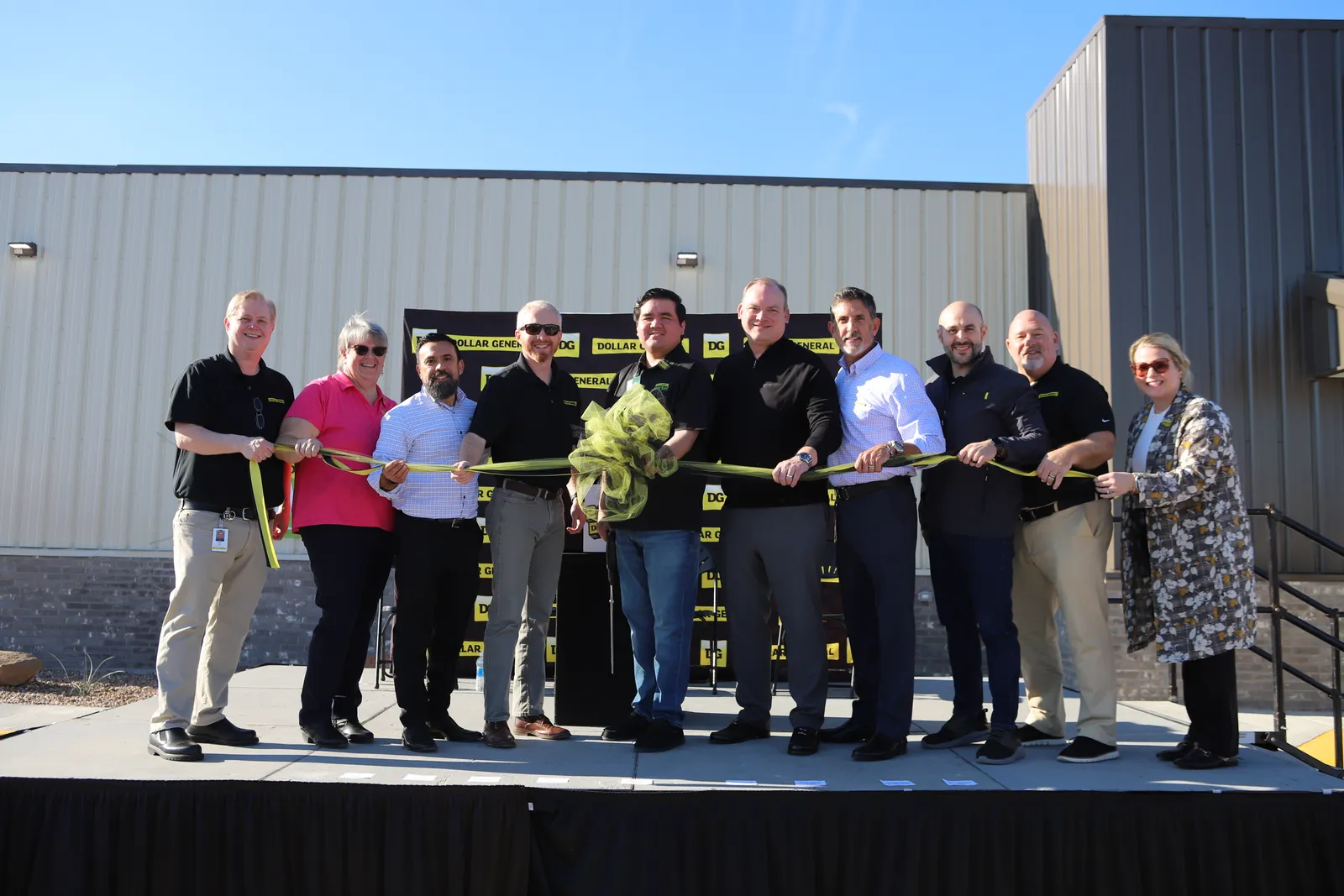 Dollar General leaders and local community members at a ribbon-cutting ceremony at the retailer&#x27;s 20,000 store in Alice, Texas.