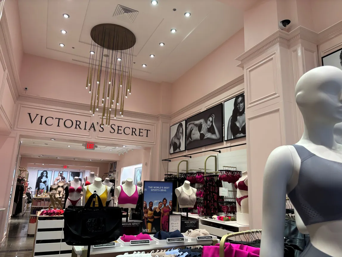 Light pink interior of Victoria&#x27;s Secret new DC store in 2025 with mannequins in bras