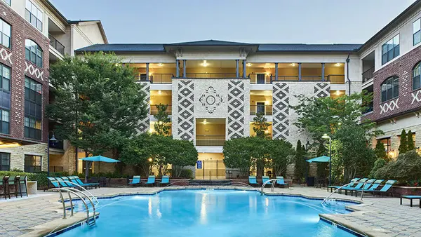 Apartment surrounding a pool
