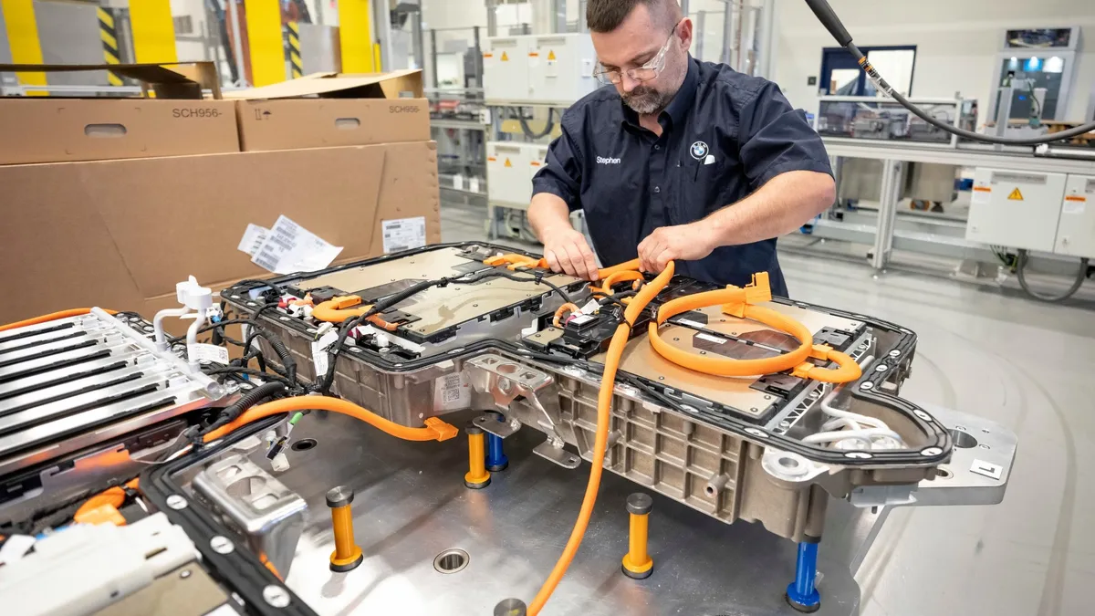 A worker assembles a battery pack for the BMW X5 xDrive45e at the automaker's factory in South Carolina.