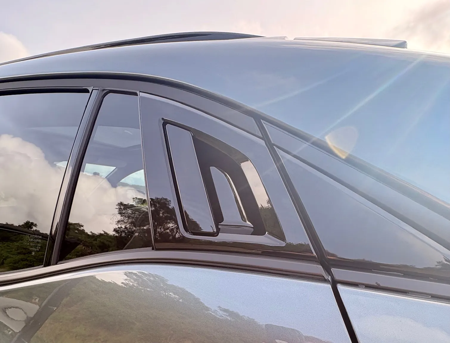 A view of a rear-door handle on the 2026 Toyota CH-R.