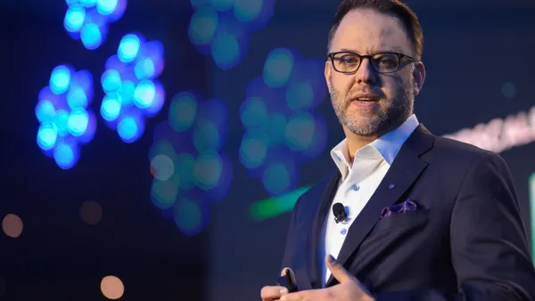 A man speaking on stage