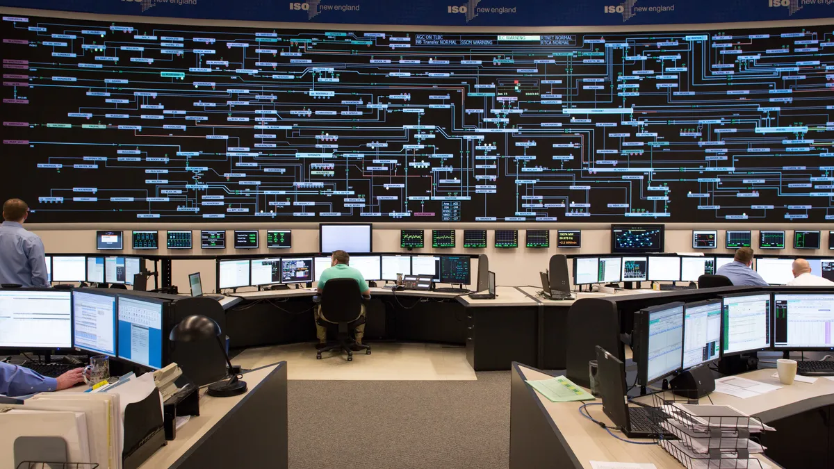 Image shows the control room of the New England Independent System Operator.