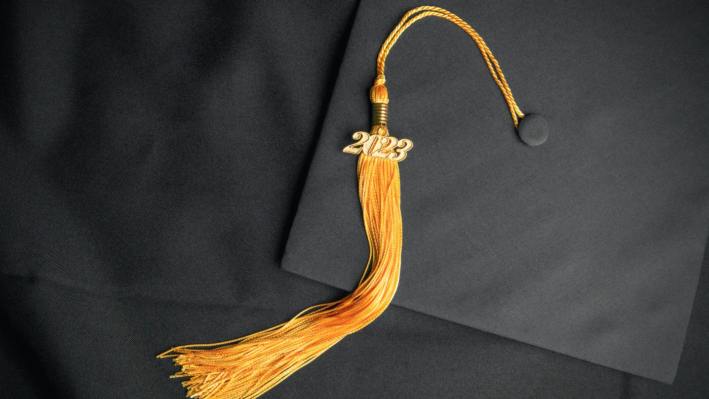 A mortarboard is mounted with a "2023" tassel.