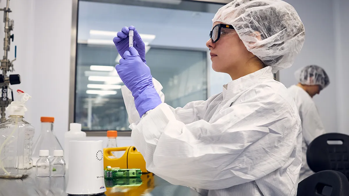 A Bluebird bio employee works at a laboratory.