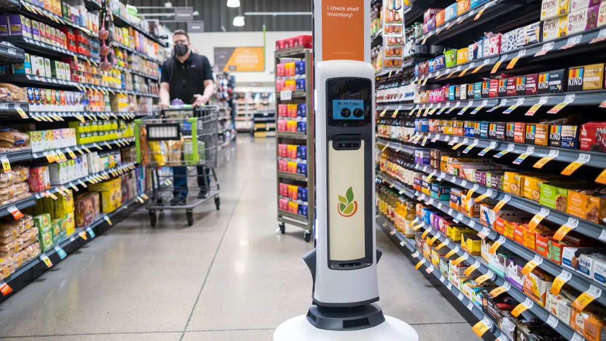 A Tally inventory robot from Simbe Robotics in a Save Mart supermarket