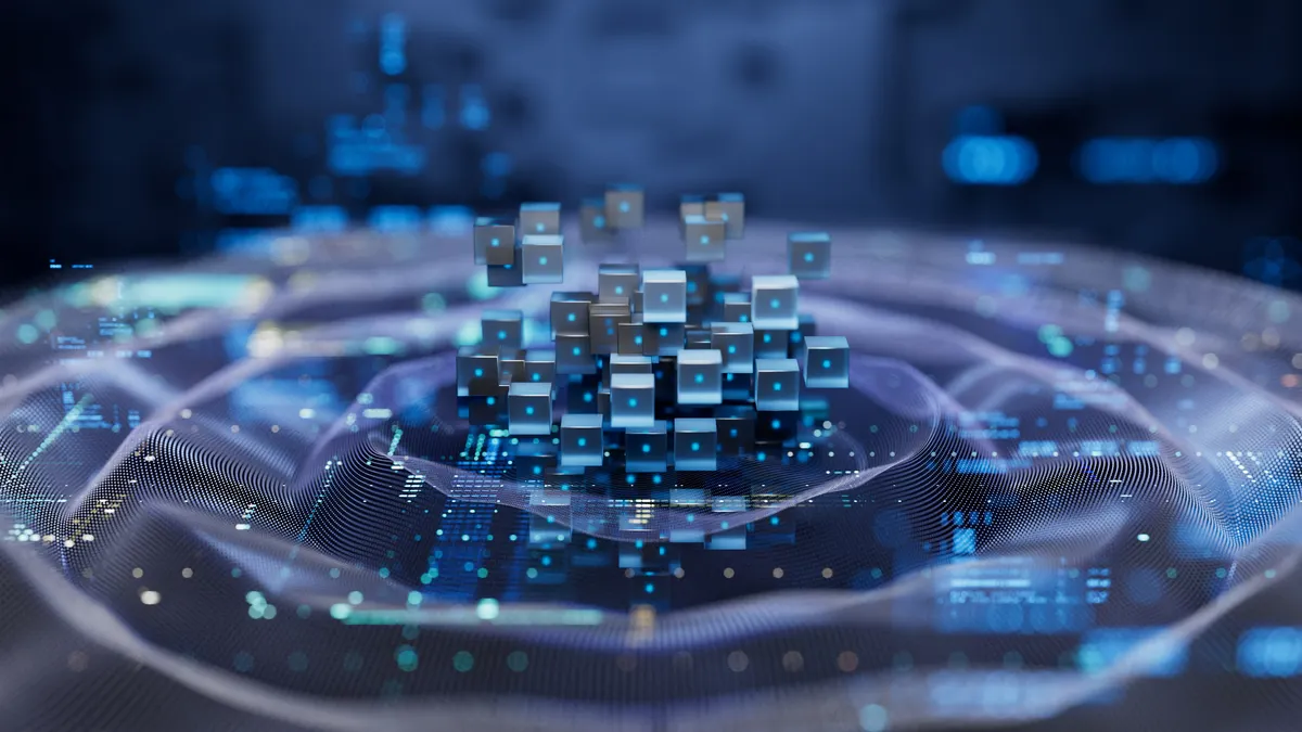 dice-like building blocks stacked atop a contoured blue digital surface