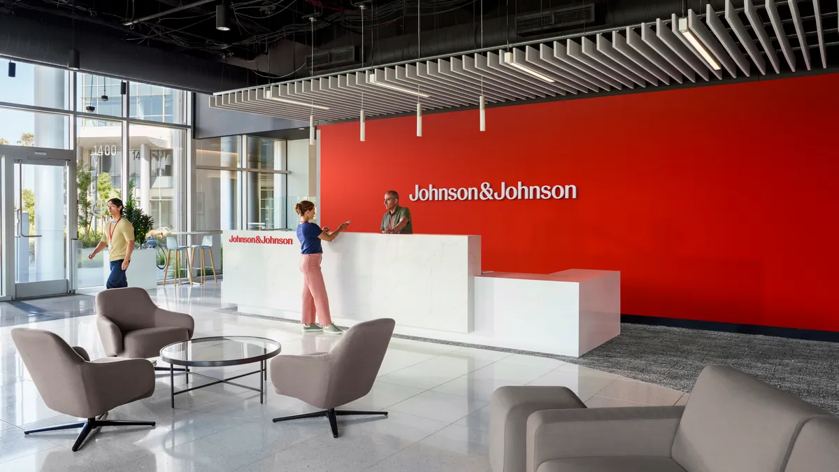 Johnson & Johnson's new logo is seen on an office lobby wall.