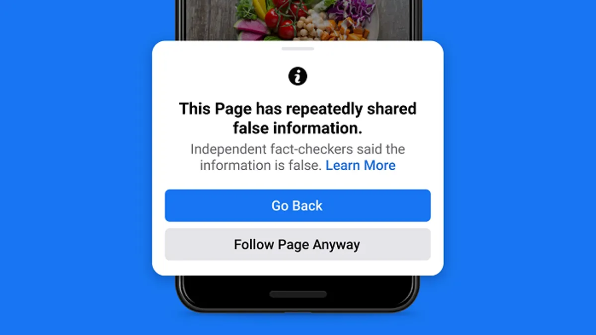 Facebook fact checking alert
