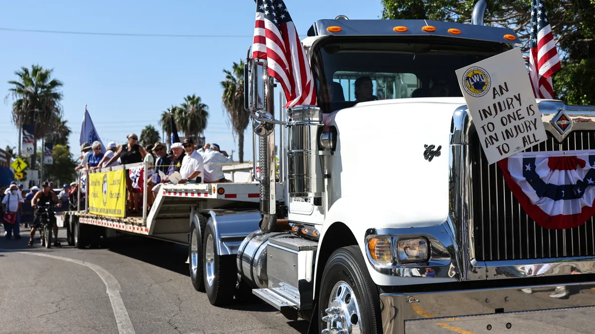 A truck supporting International Longshore and Warehouse Union members drives in the annual Labor Day Parade at Wilmington, California, on September 5, 2022.