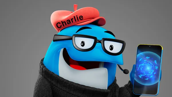 Charlie the Tuna holds up a smartphone displaying an AI assistant