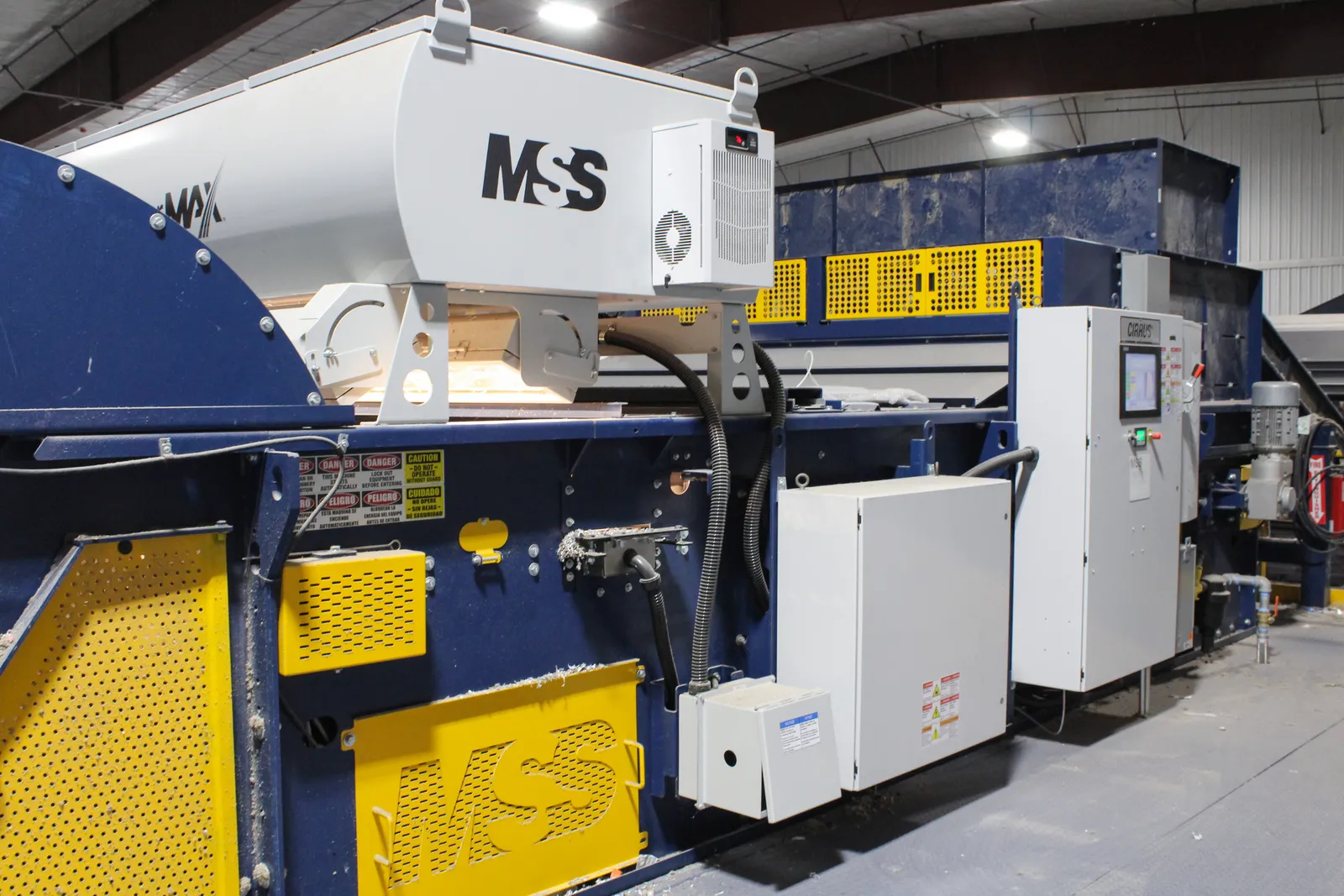 Heavy equipment used to sort recyclable materials.