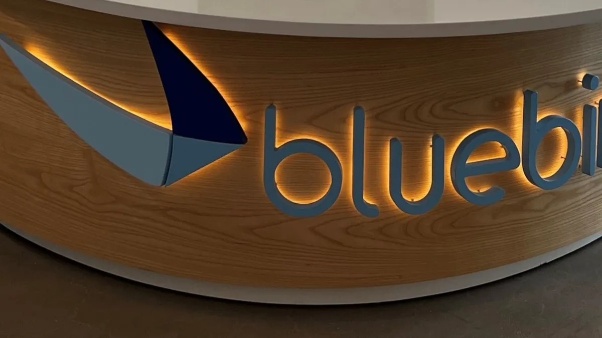 A photo of Bluebird bio signage in a corporate lobby