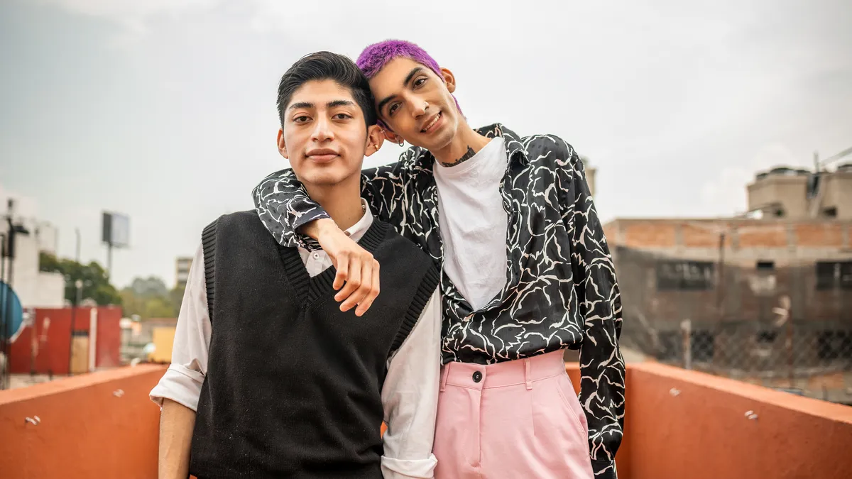 Portrait of two young men at the rooftop