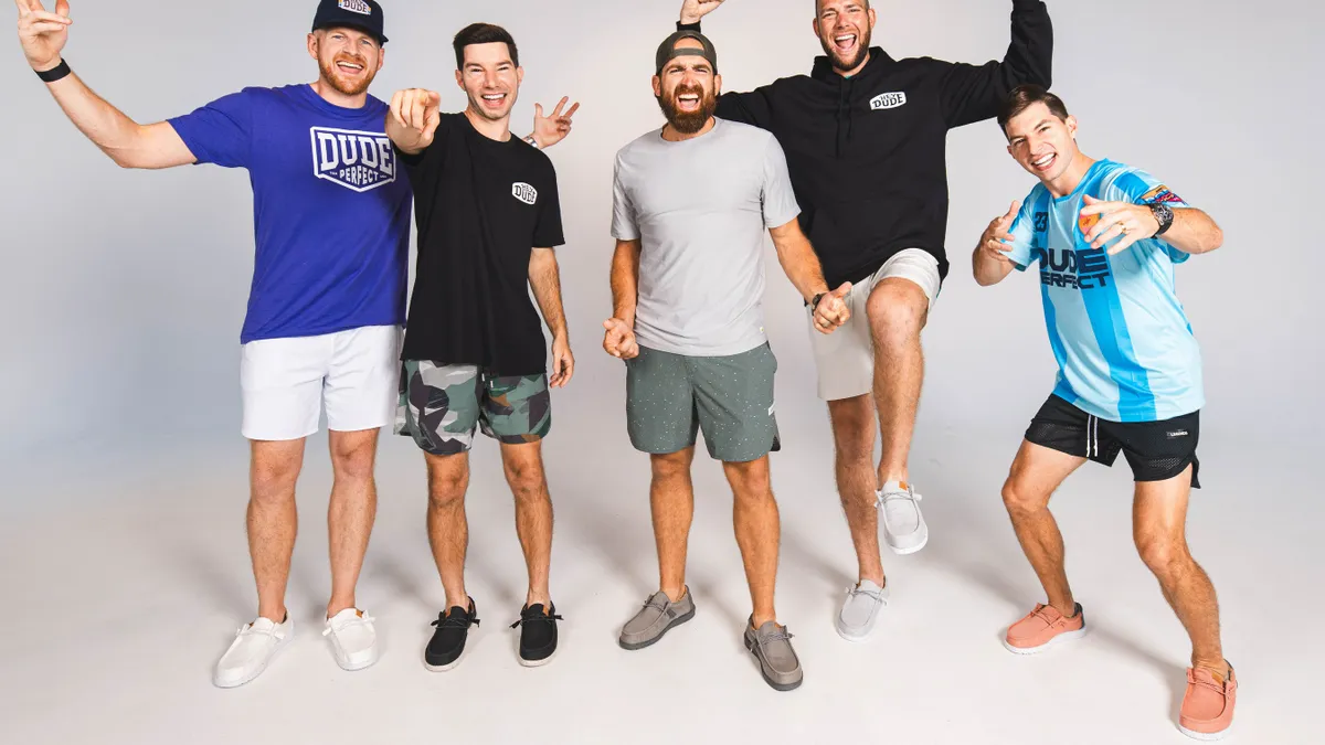 Dude Perfect group members wearing HeyDude shoes.