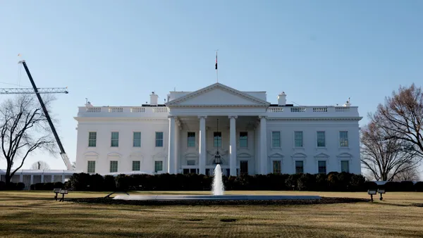 The White House exterior with a construction crane on the left.