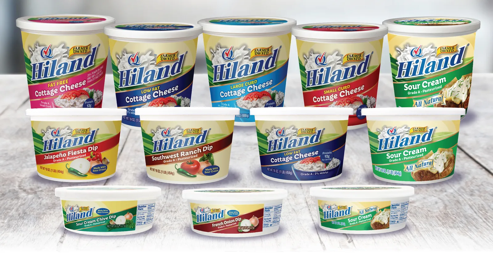 A variety of Hiland Dairy food products in branded containers.