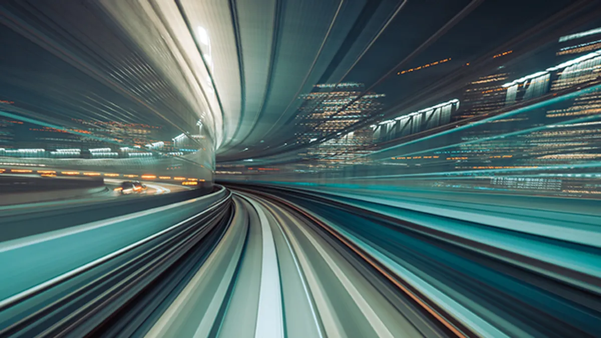 Long exposure Light trails of train moving in tunnel