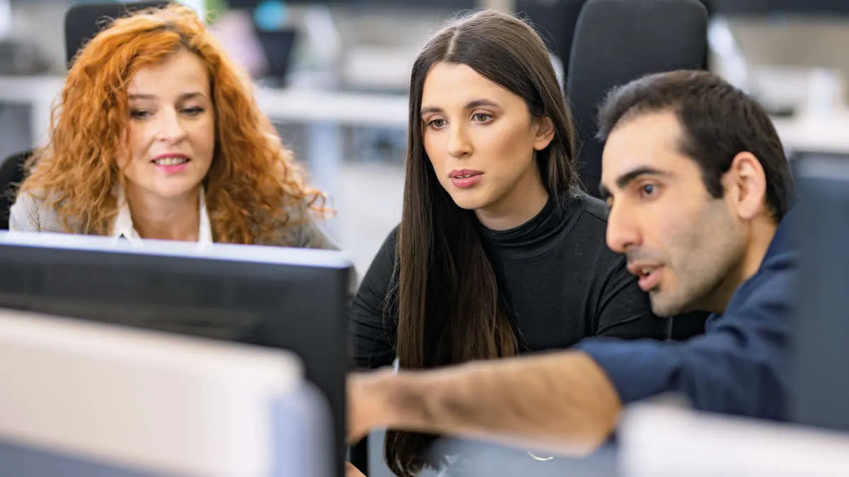 Colleagues collaborating in an office