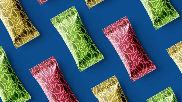 Colorful patterned wrappers arranged diagonally on a blue background.