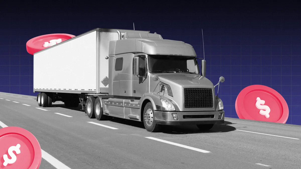 A semi-truck driving on isolated street with coins surrounding it.